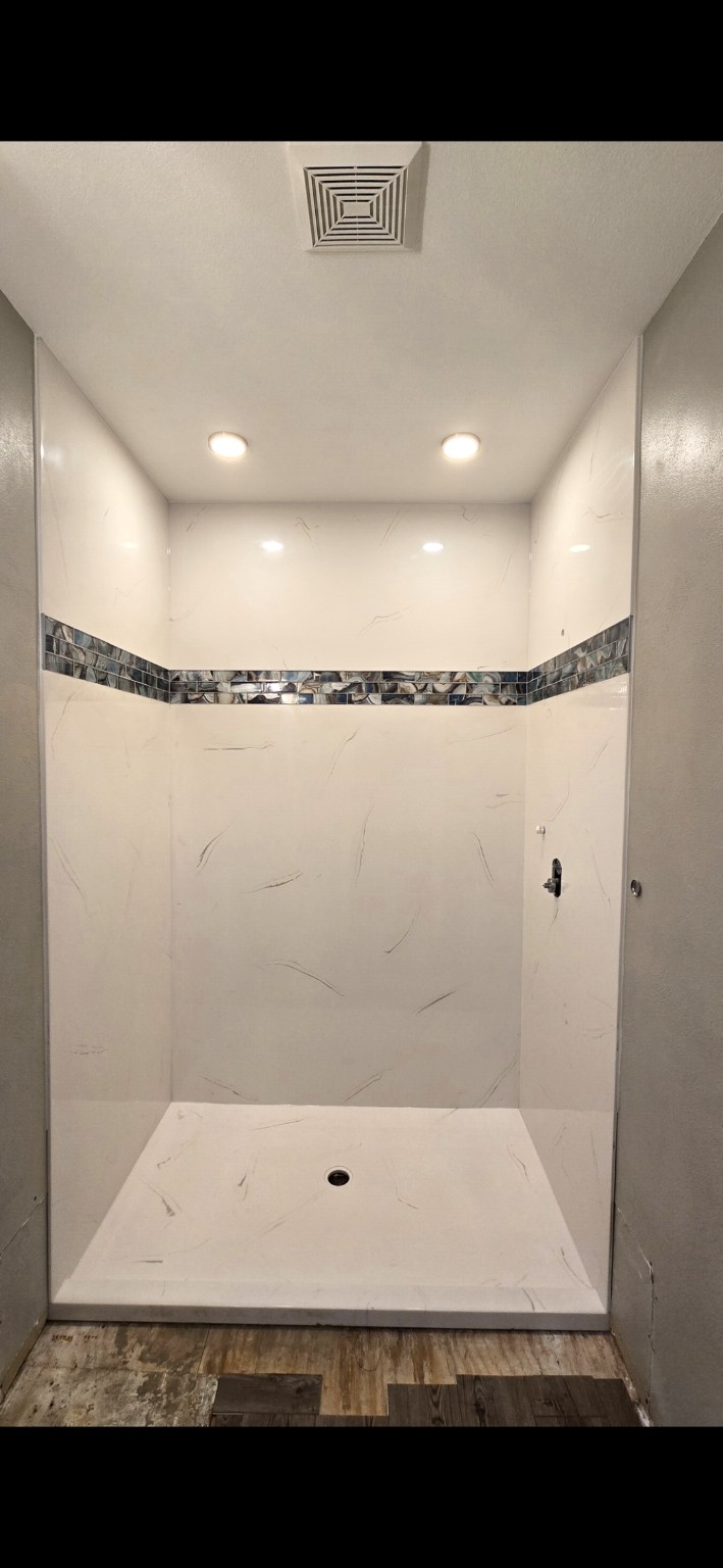 Cultured marble walk-in shower installation